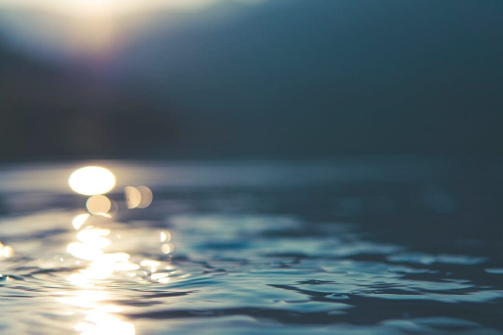 Gentle ripples in a lake at sunset